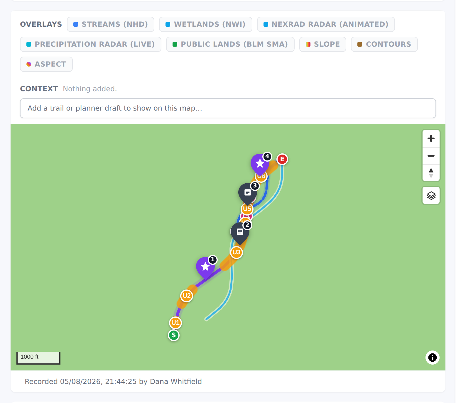 A planned trail over slope, contour and land-boundary overlays